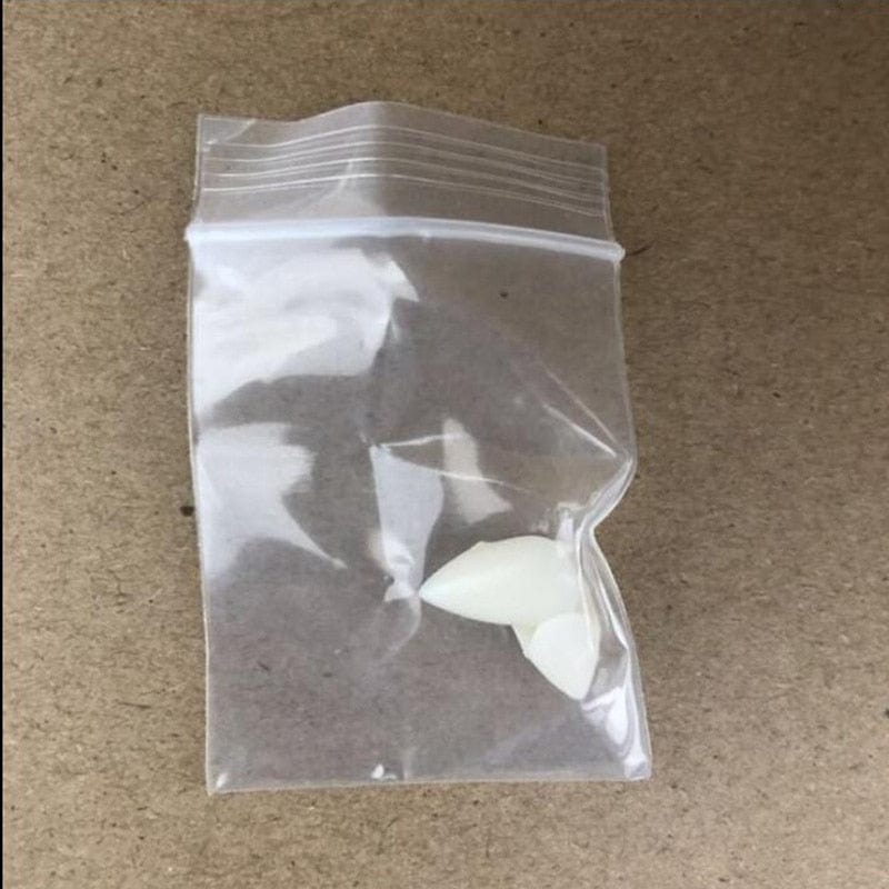 GeckoCustom 1 Pair Vampire Teeth Fangs Dentures Props Halloween Costume Props False Teeth Solid Glue Denture Adhesive Halloween Party Decor White 1.5cm